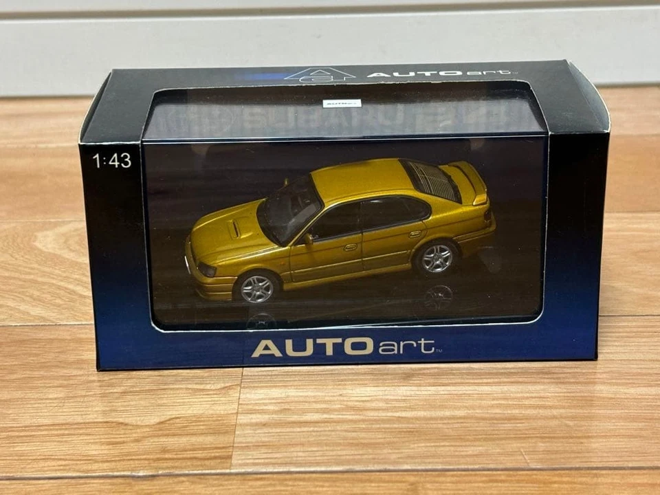 Autoart 1/43 Subaru Legacy B4 1999 modellino auto pressofuso oro finito - Immagine 1 di 4