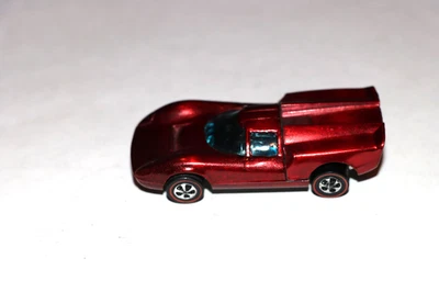 LOTE #3 HOT WHEELS RED LINE LOLA GT-70 ROJO INT NEGRO CASI COMO NUEVO ESTADO Foto 1 de 4