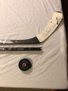 Pavel Zacha New Jersey Devils broken game used stick and puck 2020 -2021 season