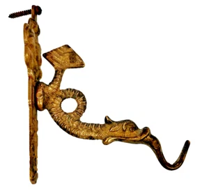 Antiguo gancho de pared antiguo de latón pez delfín ornamentado hardware náutico - Imagen 1 de 15