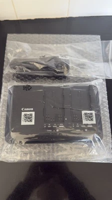 Cargador de batería doble Canon CG-A10 con cable de alimentación probado funcionando  Foto 1 de 2