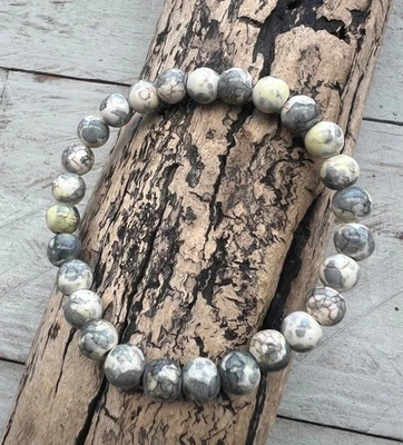 Perlen Armband Perlenarmband elastisch synth. Türkis gemustert grau natur 19cm - Bild 1 von 2