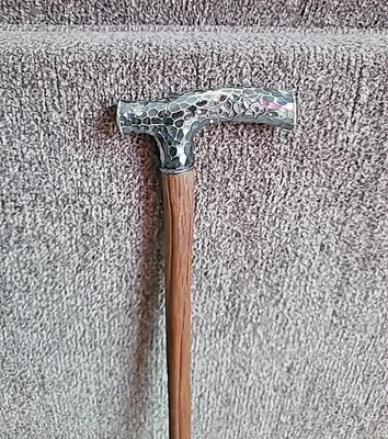 ANTIQUE WALKING STICK WITH STERLING SILVER HANDLE HAMMERED FLOWERS & LEAVES - Image 1 of 4