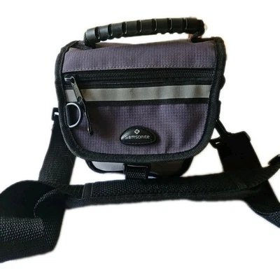 Bolso de viaje SAMSONITE pequeño para cámara con cierre a presión paredes acolchadas correa larga Foto 1 de 4