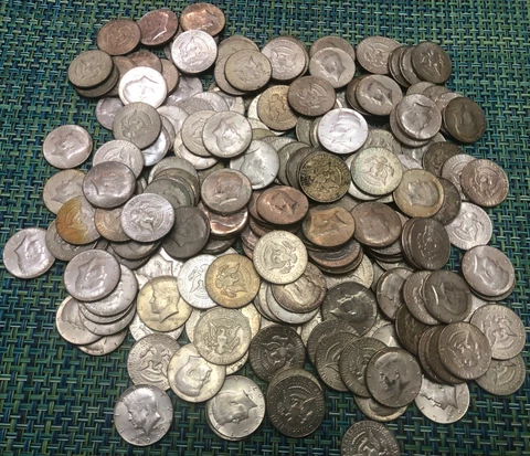 10 rolls, 200 coins. 40% silver clad Kennedy half dollars. Halves from 1965-1969 Cover