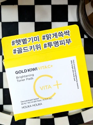 Almohadillas tónicas iluminadoras Holika Holika Gold Kiwi Vita C+ 140 ml (80 almohadillas) Foto 1 de 4