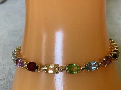 Brazalete de tenis de piedras preciosas surtidas de oro sobre plata Foto 1 de 4