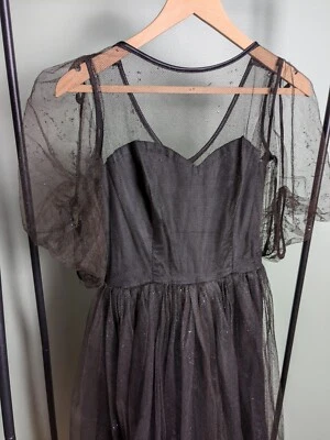 Vestido vintage de malla acampanado negro brillo manga abullonada como está Foto 1 de 4