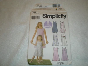 Simplicity Muster #5641 Mädchen Kinder Kleid Gr. 7-14 ungeschnitten unbenutzt Neu aus altem Lagerbestand - Bild 1 von 3
