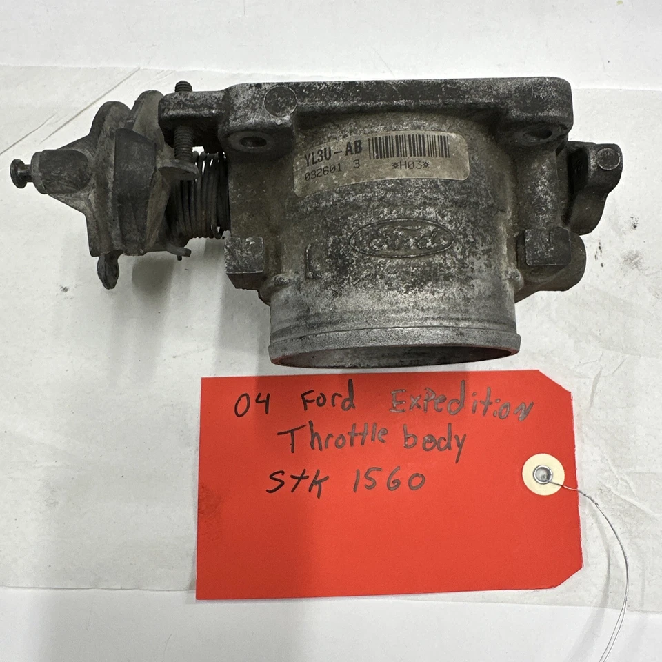 2004 FORD EXPEDITION THROTTLE BODY. PART NUMBER YL3U-AB  PRE-OWNED - Image 1 of 4