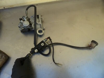 Rear brake system master caliper pads line 2011 Husqvarna SM630 SMS630 OEM #N8 - Image 1 of 4