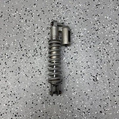 KX65 2006 suspensión de resorte de amortiguador trasero genuino OEM Kawasaki RM65 (2000-2022) Foto 1 de 4