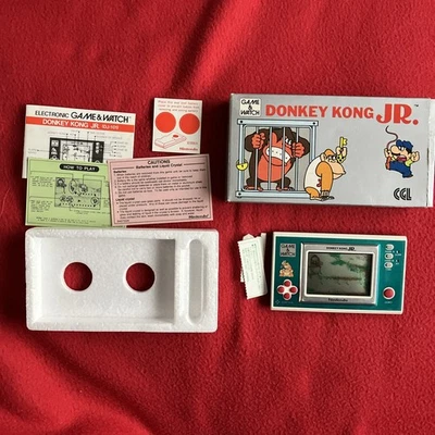 Nintendo Donkey Kong Jr. gioco e orologio in scatola con istruzioni ottime condizioni - Immagine 1 di 4