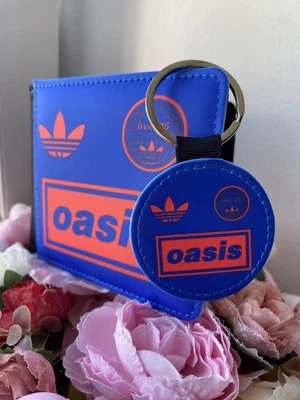 Cartera y llavero Adidas Oasis 25 azul y rojo para hombre Foto 1 de 4