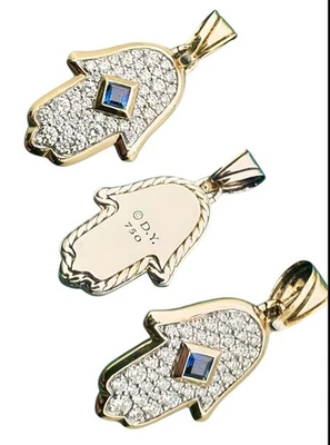 Amuleto Hamsa oro amarillo de 18 quilates con pavé de diamantes y zafiro azul, 25,1 mm Foto 1 de 4