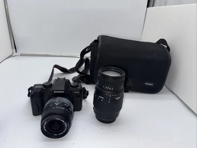 Sigma SA-7N SLR Film Camera with 28-80mm Lens and 70-300mm lens, original bag - Image 1 of 4