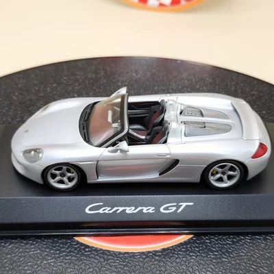 Minichamps 1/43 Porsche Carrera GT Spyder plateado 2001 concesionario WAP02007411 Foto 1 de 4