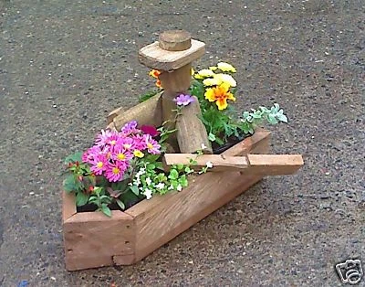 hand made designer rustic garden planter man in boat