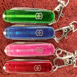 Lot of 4 Victorinox Classic 58mm Translucent Red Ruby , Pink, Blue, Green - Picture 1 of 20