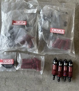 Brand New Traxxas E-Revo & Revo Shocks, Springs, & Long Travel Rocker Sets - Picture 1 of 5