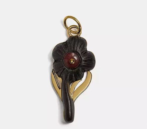 Grazioso ciondolo fiore Coach per collana nuovo