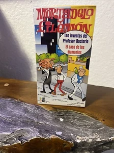 Mortadelo Y Filemon VHS(Los Inventos Del Profesor Bacterio El Caso De. Los Diam. - Picture 1 of 5