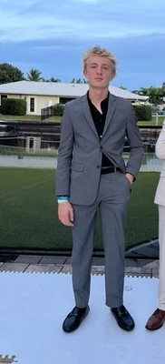 Pantalones de traje Calvin Klein gris ajustados infinitos elásticos para niño talla 16R Foto 1 de 4