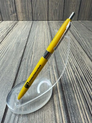 Bolígrafo amarillo Greeley National Bank de colección con clip plateado Foto 1 de 3