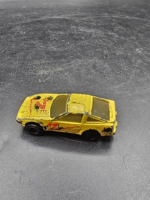 Tiras de metal fundido a presión ERTL Nissan 300ZX Z31 1/64 velocidades Foto 1 de 4