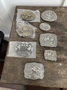 8 Vintage NFR National Finals Rodeo Hesston Belt Buckles Sealed 1980 81 83 84 85 - Picture 1 of 13