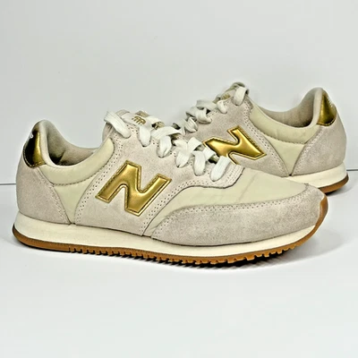 Zapatos deportivos New Balance Comp 100 de gamuza de cuero para mujer 6 B beige dorado preppy Foto 1 de 4