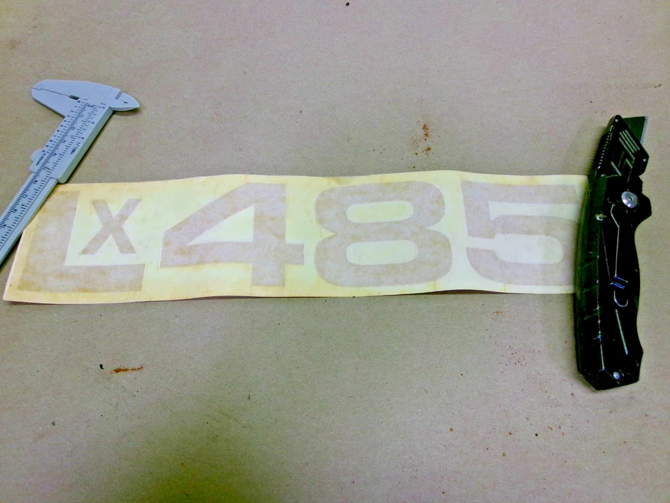 Cargador de calcomanías New Holland LX485 Foto 1 de 2