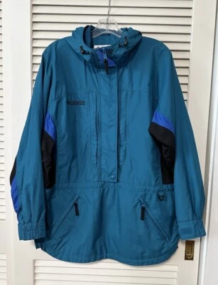 Chaqueta cortavientos Columbia mediana para mujer de nailon ligera azul azulado negra Foto 1 de 4