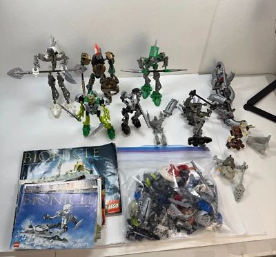 Lot of LEGO Bionicle Figures Loose Parts & Misc Manuals Posters Incomplete - Image 1 of 4