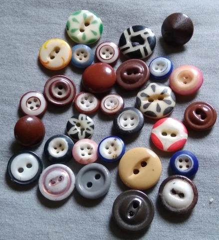 30 Antique Stencil and China Buttons Cover
