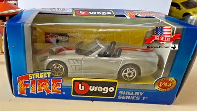 1/43 Burago Street Fire SHELBY SERIE 1 Raya Plateada/Roja-Diecast Hecho en Italia Foto 1 de 4
