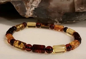 7.5" BARREL SHAPED MULTICOLORED UNISEX GENUINE BALTIC AMBER STRETCH BRACELET - Picture 1 of 5