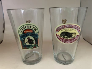 GUINNESS EXTRANJERO EXTRA STOUT Juego de 2 vasos de cerveza pinta bar cueva - Imagen 1 de 9