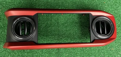 Toyota Tacoma 2016-2023 radio tablero bisel ventilaciones de aire borde naranja OEM 55405-04130 Foto 1 de 4