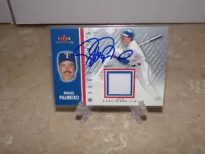 RAFAEL PALMEIRO FIRMADO 2003 FLEER JERSEY RELIQUIA TARJETA RANGERS - Imagen 1 de 1