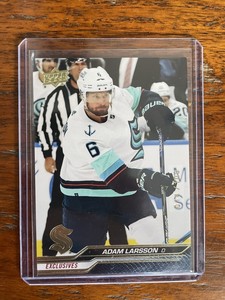 2023-24 Upper Deck Series 1 UD Exclusives /100 #153 Adam Larsson