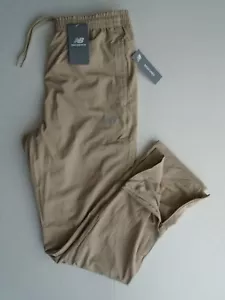 NEW BALANCE All Motion JOGGERS Mens Running Pants w/Mesh Tan Back Pkt. S,M,L,XL - Picture 1 of 3