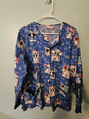 Cherokee Brand Winter Characters On Blue Scrub Jacket  - sz S - Image 1 of 4