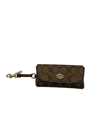 Estojo de óculos de sol COACH em lona exclusiva dourado/caqui marrom claro 73639 - Imagem 1 de 4