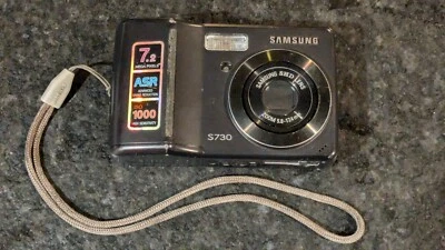 Cámara digital Samsung Digimax S730 7,2 MP negra - probada no funciona para piezas Foto 1 de 4