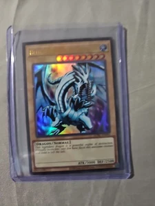 Blue-Eyes White Dragon (Version 1) LCKC-EN001 Yu-Gi-Oh Kaiba - Picture 1 of 2