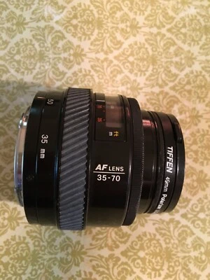 Minolta AF 35-70 Lens w/ polarizer filter & front lens cap - Image 1 of 4