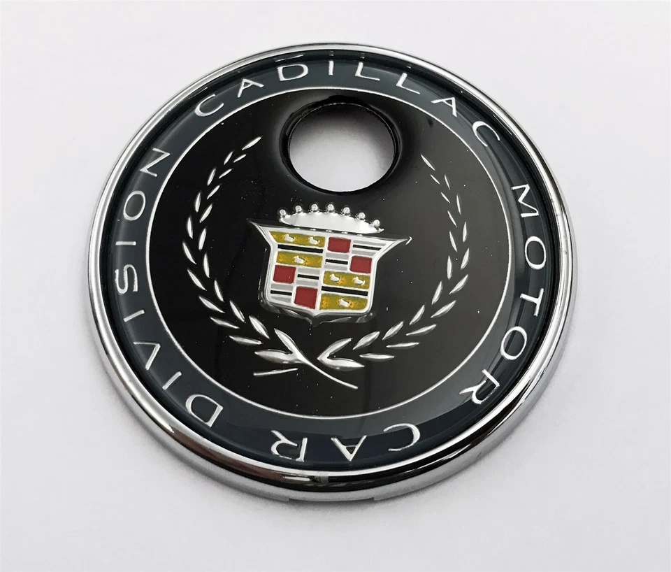 1991-2002 CADILLAC DEVILLE BLACK TRUNK LOCK BEZEL EMBLEM 3" ROUND NEW 3536690 - Image 1 of 1