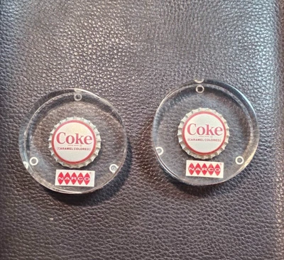 Pisapapeles transparentes Coca-Cola Corporation tapas de botellas de Coca-Cola color carmelo NARCO Foto 1 de 4