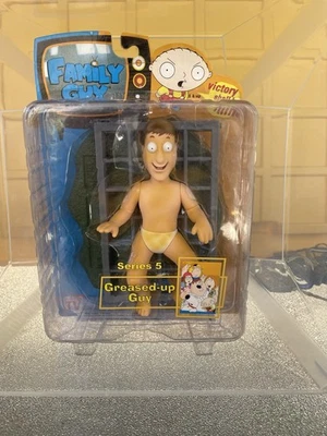 Figura Hombre de Familia Greased-up Guy Serie 5 Mezco 2006 Foto 1 de 4